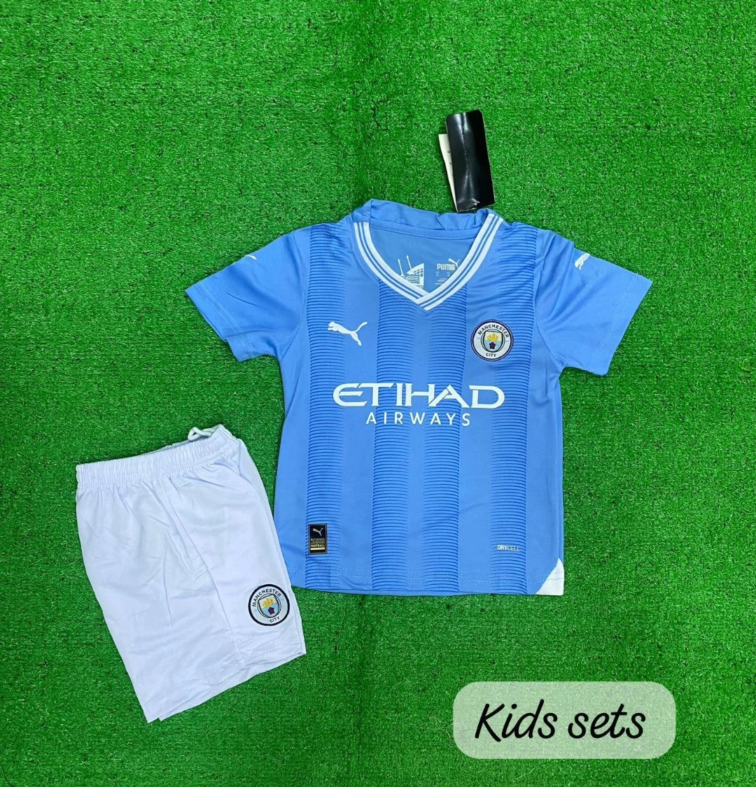 MANCHESTER CITY HOME KIDS JERSEY SET 2023 24 Maniac Unisex Clothing